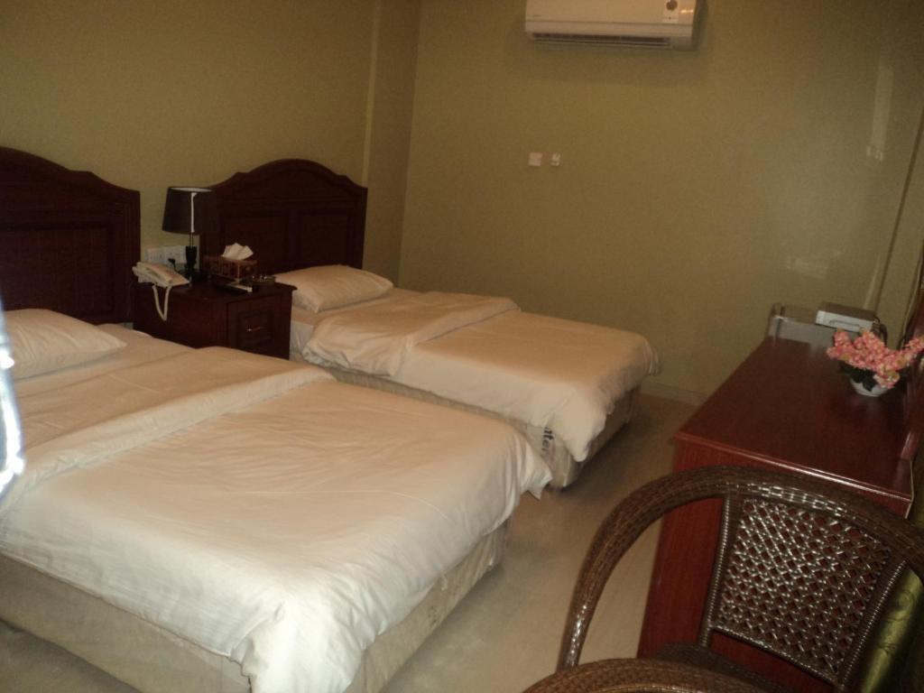 Taj Al Arab Hotell Al Buraimi Rum bild
