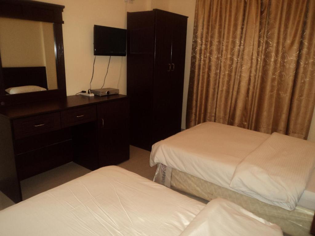 Taj Al Arab Hotell Al Buraimi Rum bild